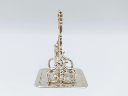 Zilveren miniatuur kind op schommel, 19e eeuws