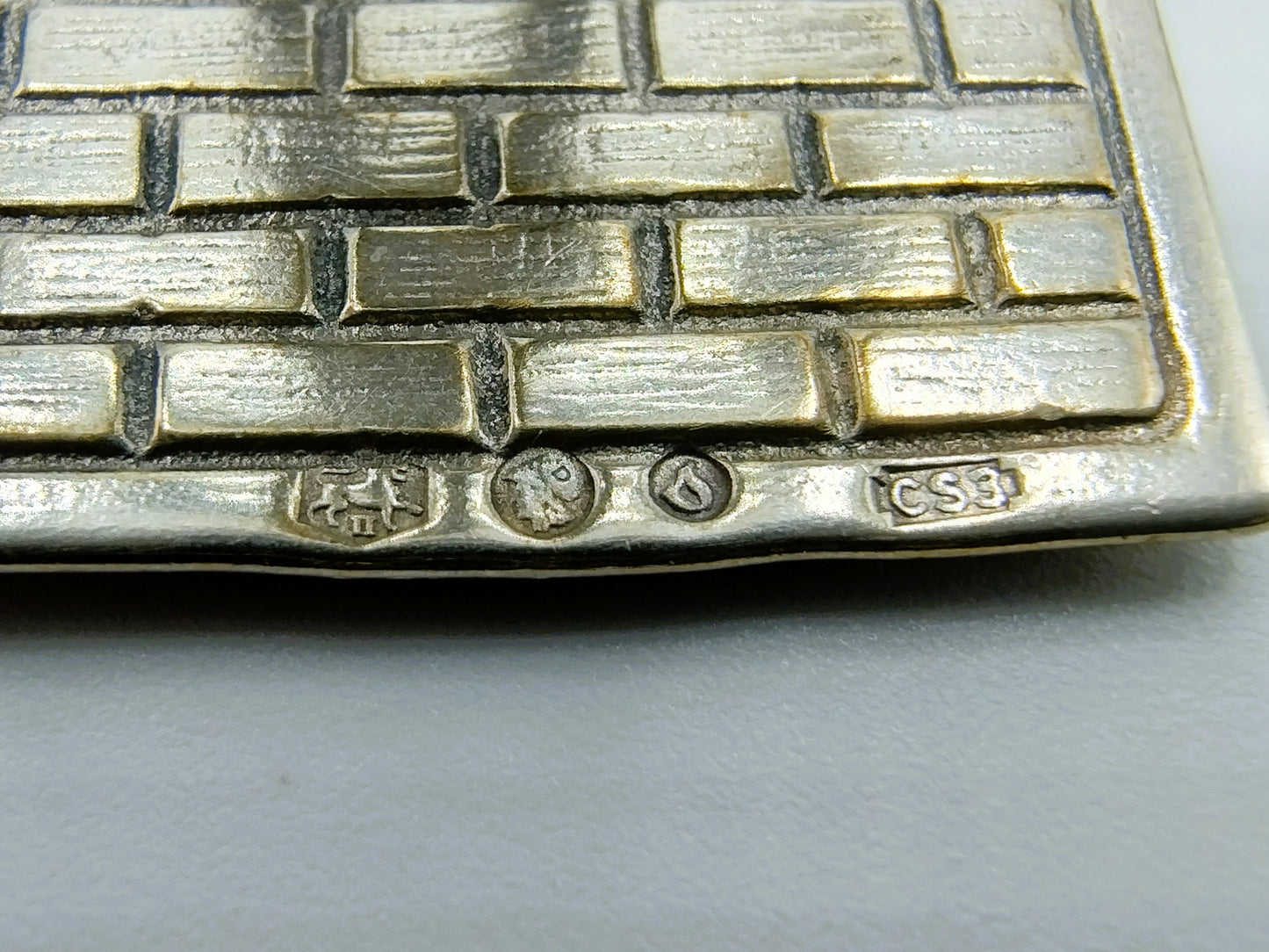 Zilveren miniatuur man met juk, C.A. Stout, Rotterdam, 1978