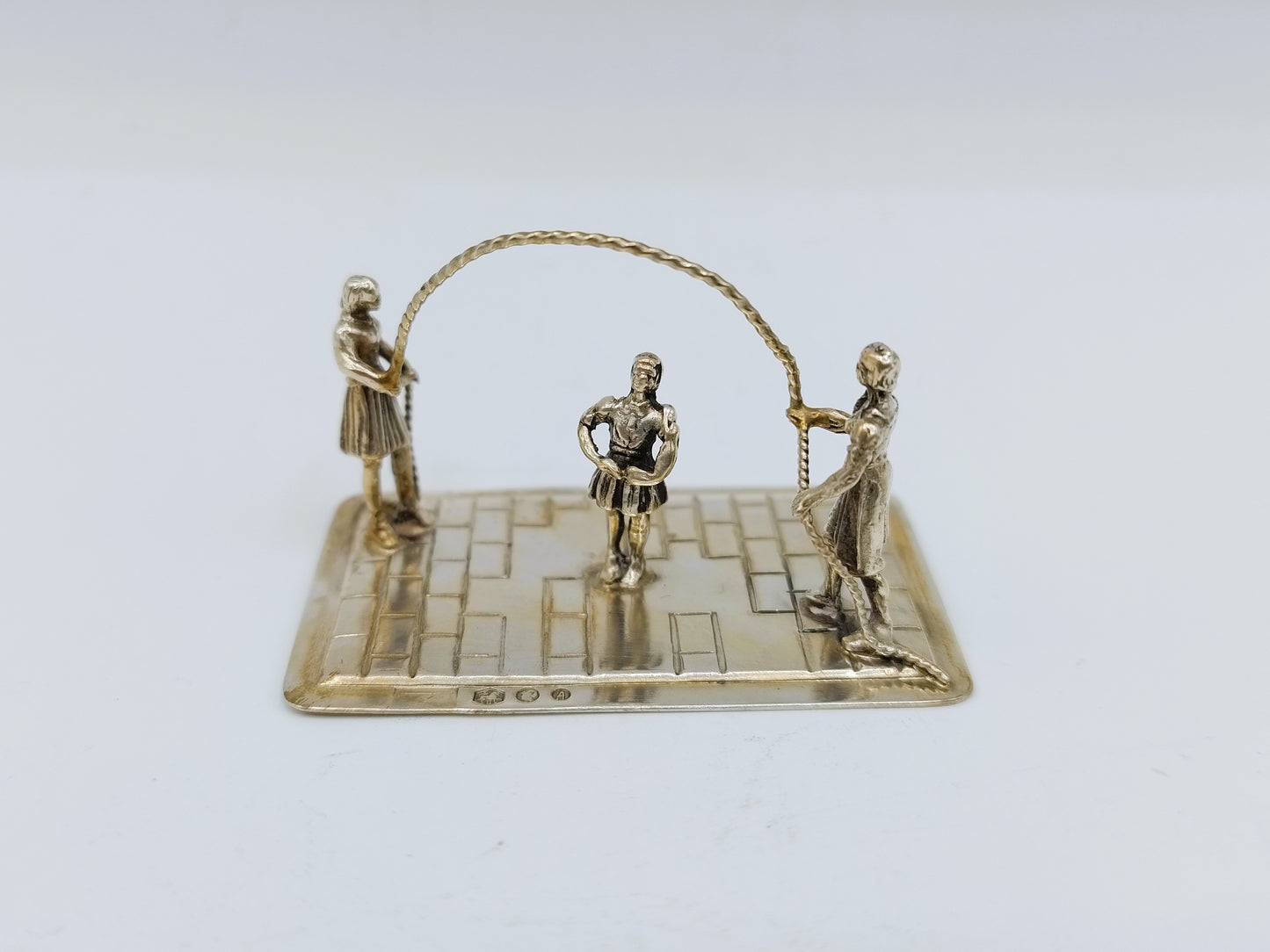 Zilveren miniatuur touwtje springen, Amsterdam, 1985