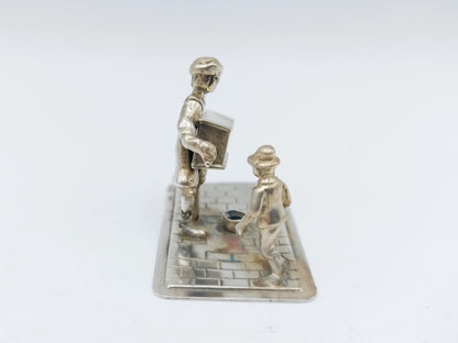 Zilveren miniatuur draaiorgelspeler, Amsterdam,  20e eeuws
