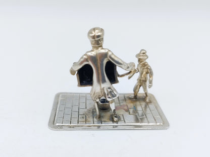 Zilveren miniatuur draaiorgelspeler, Amsterdam,  20e eeuws