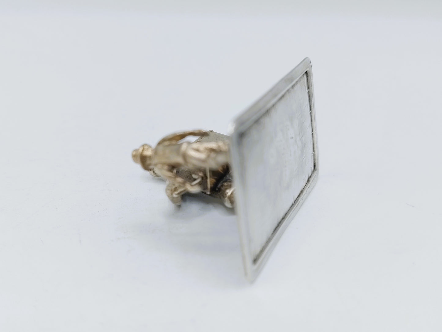 Zilveren miniatuur draaiorgelspeler, Amsterdam,  20e eeuws