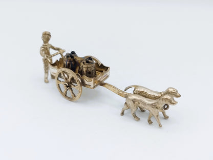 Miniatur-Mann aus Silber mit Hundewagen, 20. Jahrhundert