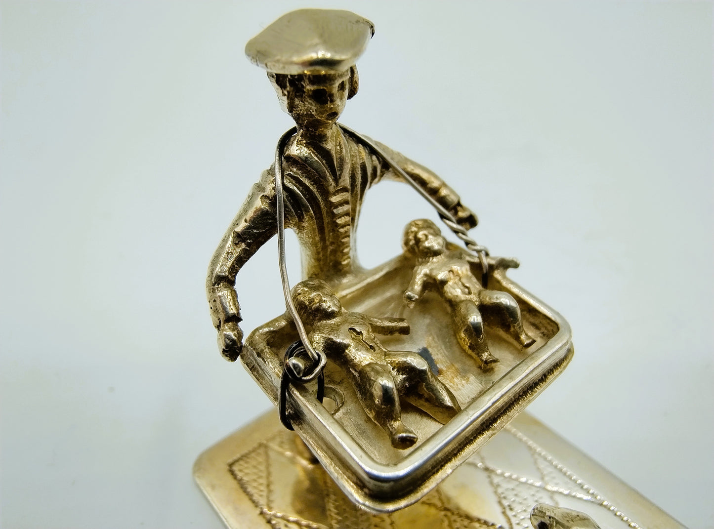Zilveren miniatuur poppenverkoper,  A.F. Westerwaal, Amsterdam, ca. 1910
