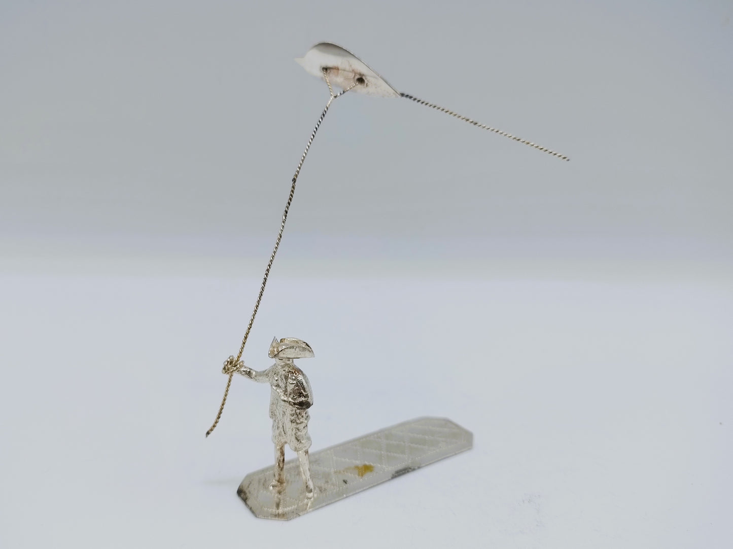 Zilveren miniatuur, man met vlieger, H. Buijs, Dordrecht, ca. 1865