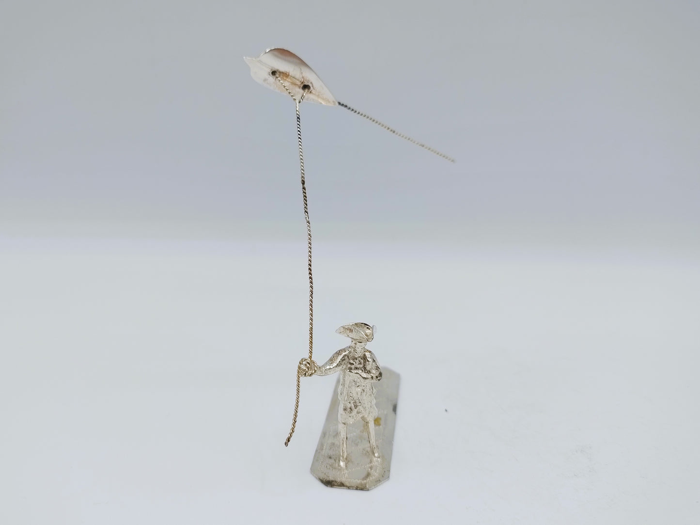 Zilveren miniatuur, man met vlieger, H. Buijs, Dordrecht, ca. 1865