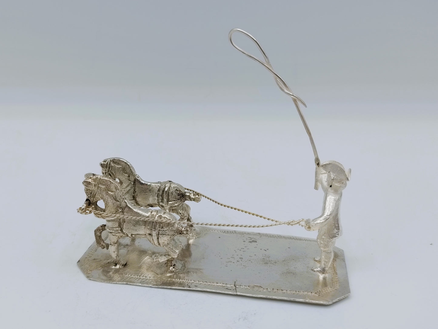 Zilveren miniatuur man met tweespan paarden, W. Freen, Dordrecht, 19e eeuws