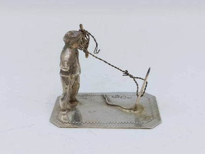 Zilveren miniatuur, man met vlieger, J. Postmus, Hoorn, 1916