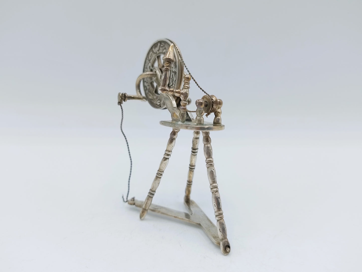 Zilveren miniatuur spinnenwiel, J.S. Zwanenburg, Sneek, ca. 1920