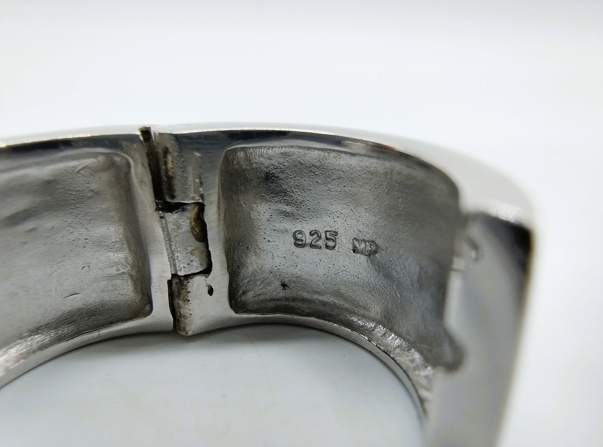 Zilveren oorbelcreool met 925-stempel aan de binnenkant