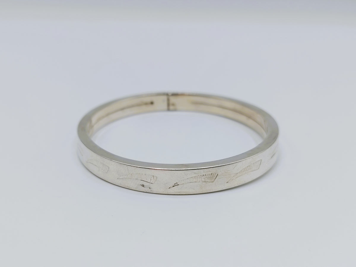 Zilveren armband met gegraveerde golfvormen en vintage afwerking