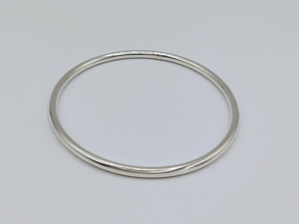 Zilveren slavenarmband, ovale ring met glanzende, licht gebogen vorm