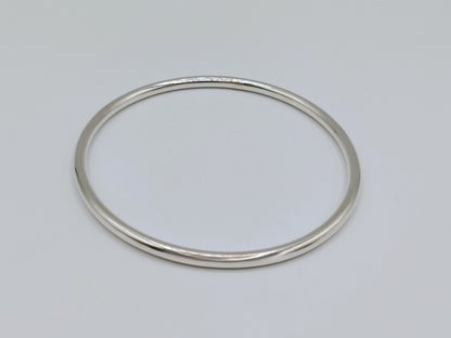Zilveren slavenarmband, ovale ring met glanzende, licht gebogen vorm