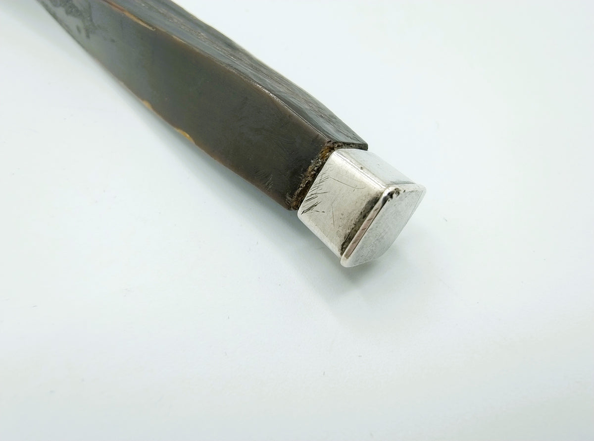 Zilveren punch- of bowllepel met ebbenhouten steel, 18e eeuws
