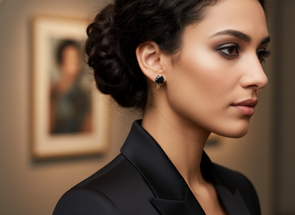 Gold screw earrings with black spinel