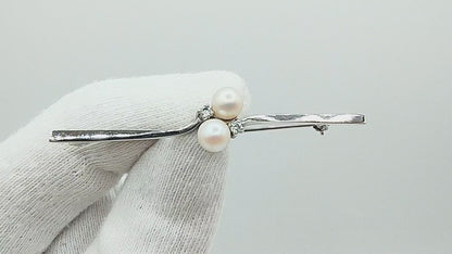 Zilveren broche met zirkonia's en parels