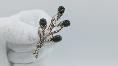 White metal flower brooch with jade and marcasite